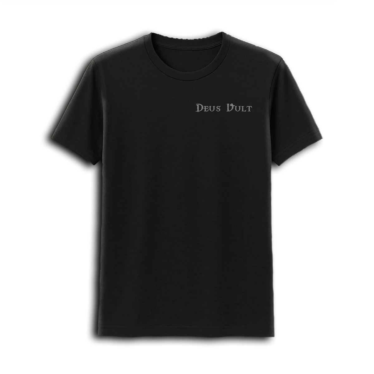 The Deus Vult T-Shirt by Emerson Knives, Inc. is a black tee with "DEUS VULT" in small white medieval font on the upper left chest and a subtle Jerusalem Cross inspired by Crusader Knights.