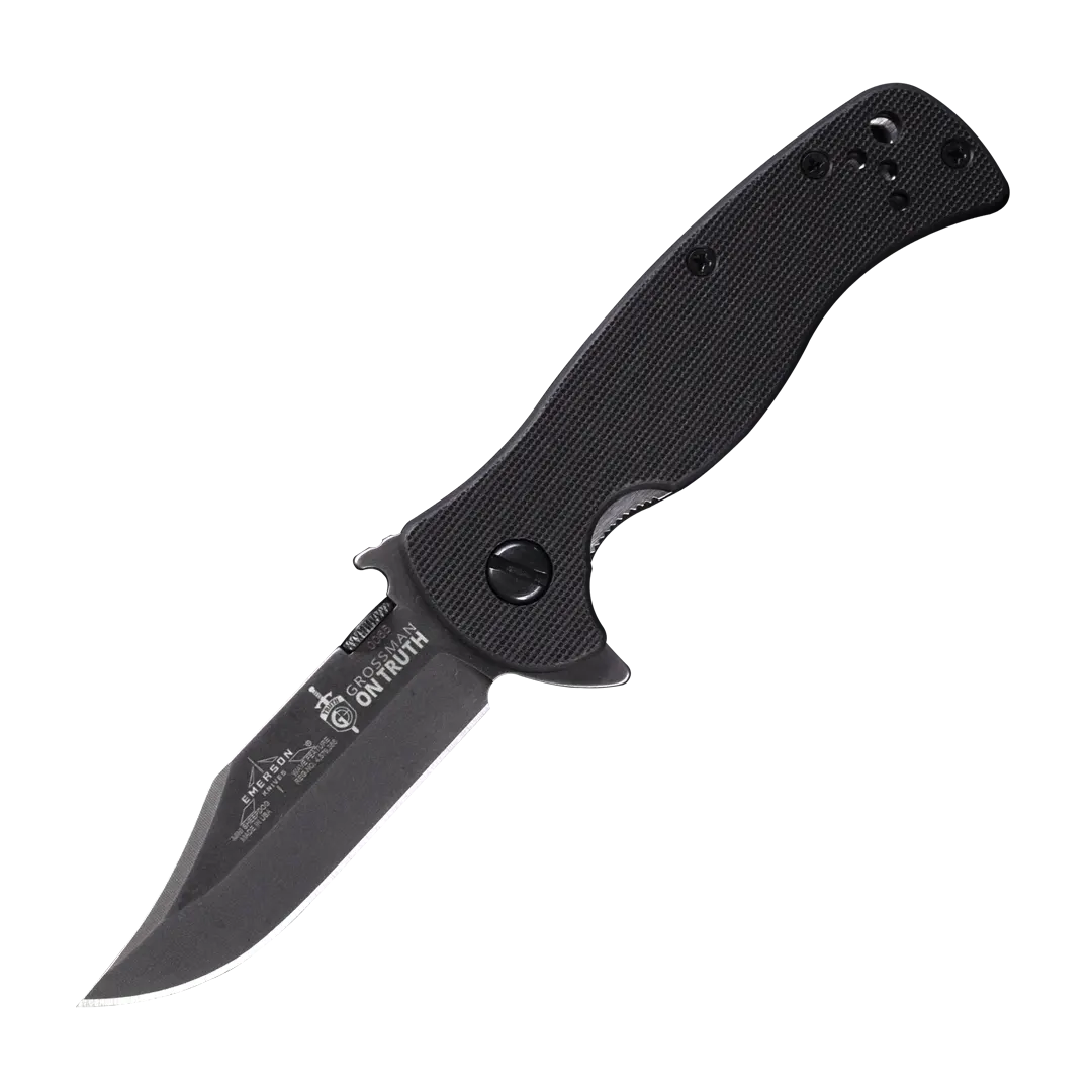 A black Emerson Knives, Inc. Mini Sheepdog Bowie pocket knife with a textured handle and partially serrated blade, ideal for everyday carry, displayed against a plain white background.
