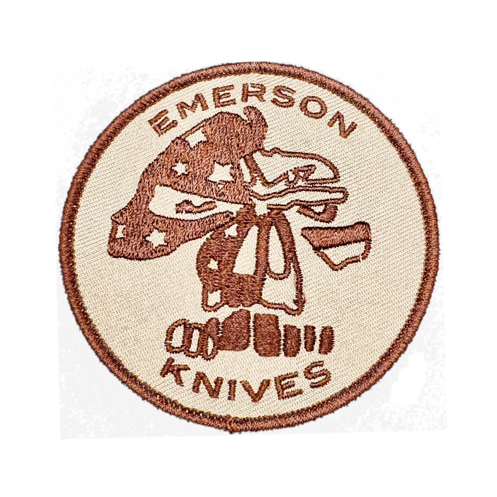 The Emerson Skull Patch by Emerson Knives, Inc. is a round black patch with "EMERSON KNIVES" in white and a skull wearing an American flag bandana with red, white, and blue stars and stripes.