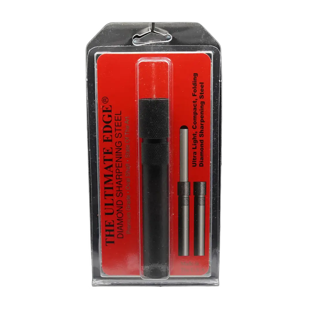 A Knife Sharpener by The Ultimate Edge features a black handle and silver shaft. An American flag sticker and "Made in the USA" are displayed on the shaft.