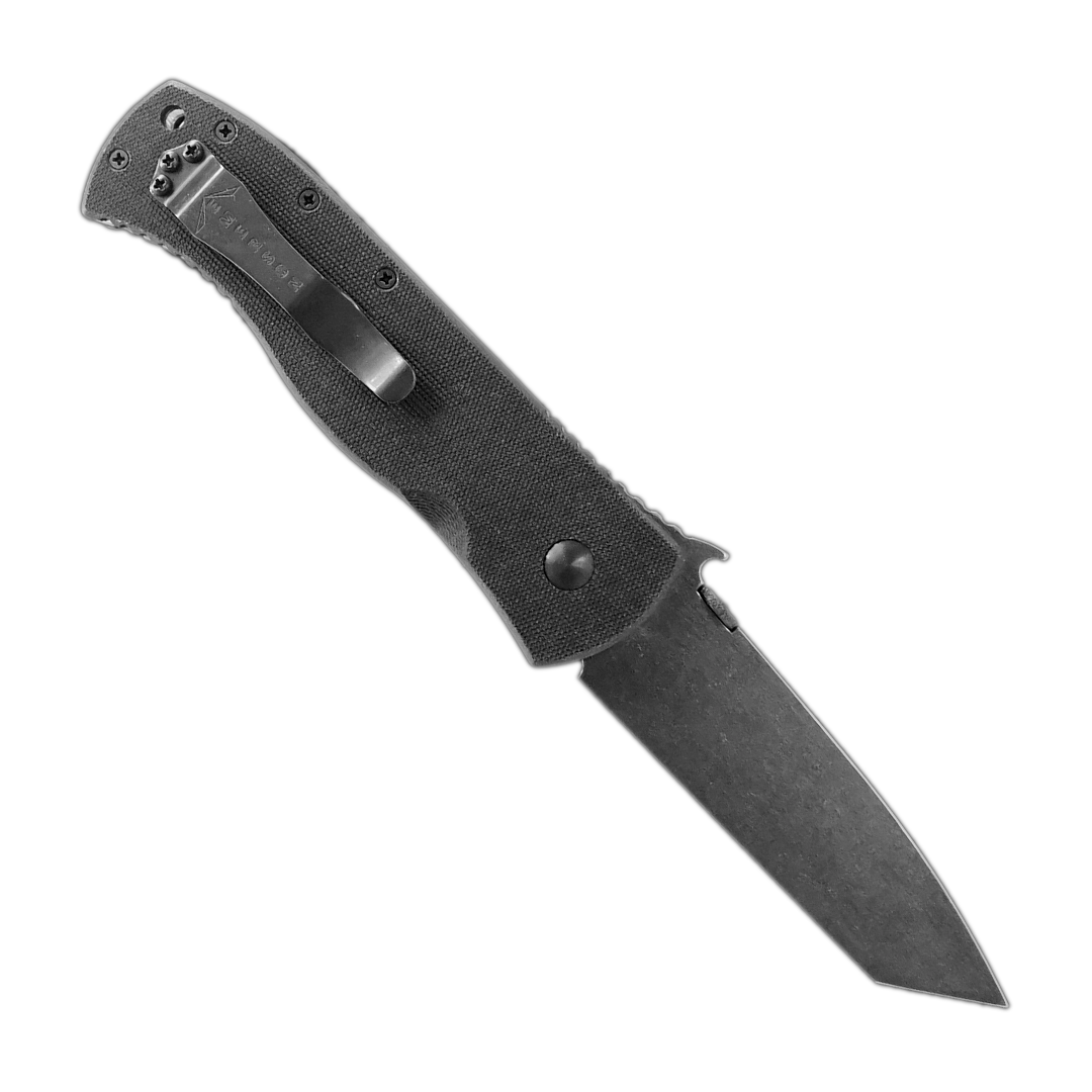 The Super CQC-7BW by Emerson Knives, Inc. is a black folding pocket knife featuring a textured handle and tanto-style blade, partially engraved with text and the Emerson CQC-7BW logo near the hinge.