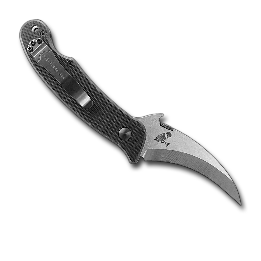 The Super Elvia by Emerson Knives, Inc. features a curved hawkbill blade and textured black handle, displayed open on a white background—an ideal everyday carry survival tool.