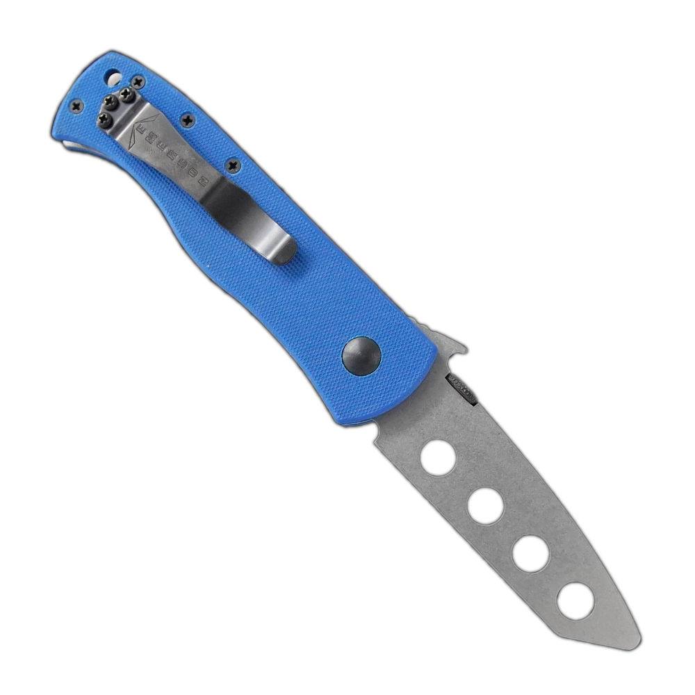 The CQC-7BW Trainer by Emerson Knives, Inc. is a folding knife with a blue handle and silver blade with three large cutouts and engraved markings—perfect for Emerson enthusiasts or CQC training knife collectors.