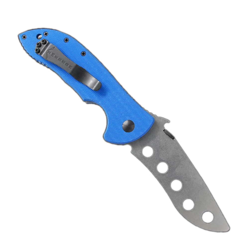 The Commander Trainer by Emerson Knives, Inc. is a folding training knife with a blue textured handle and a stainless steel blade with circular cutouts and thumb hole—perfect for CQC practice.
